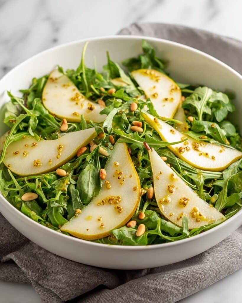 Rocket and Pear Salad with Parmesan and Toasted Pine Nuts Recipe